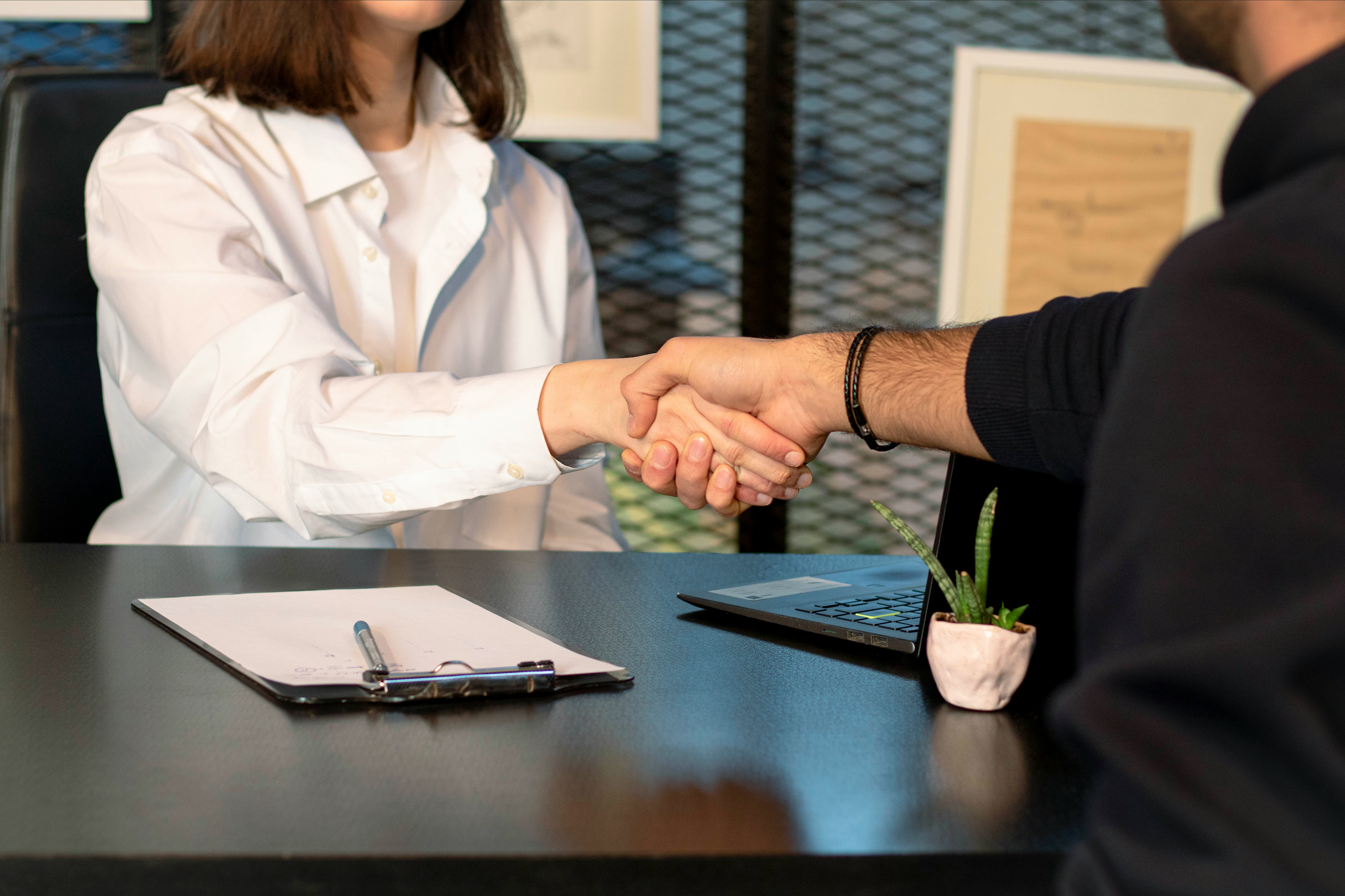 P.K. Dang & Associates — Chartered Accountants meeting with a client